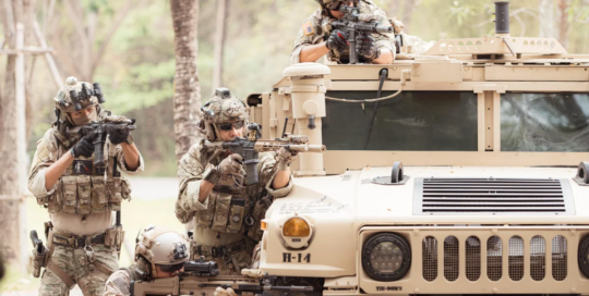 Armored assault vehicle crew members
